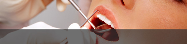 Dentist treating patient in your nearest oral surgery